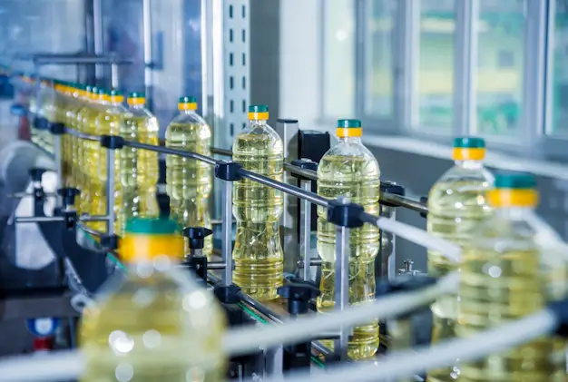 bottling-line-sunflower-oil-bottles-vegetable-oil-production-plant-high-technology_179755-9139